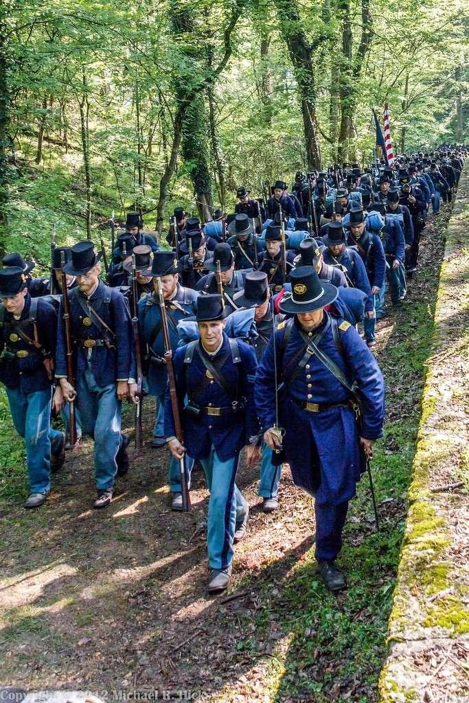 Civil War soldiers marching during a historical reenactment in the United States